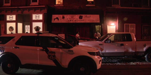 Police cars outside home invasion scene