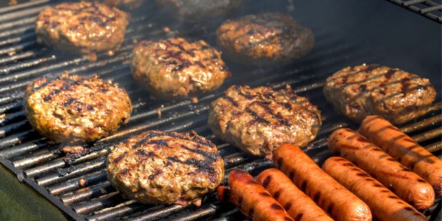 hamburgers and hot dogs on the grill