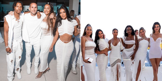 Kim Kardashian poses with Hailey Bieber and sister Kendall Jenner at white party