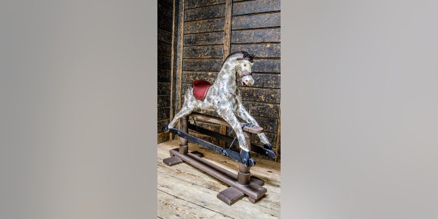 Wooden rocking horse toy is up for sale