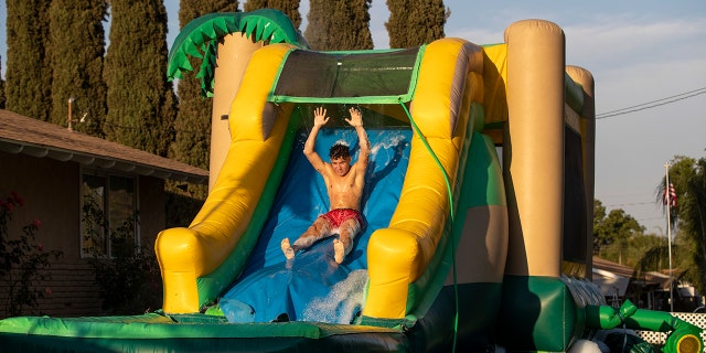 Inflatable slip 'n slide