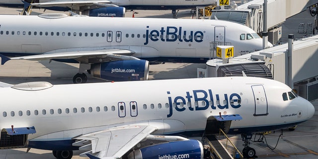 Three Jet Blue airplanes