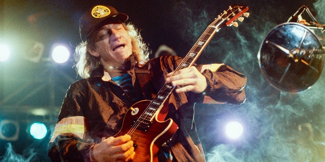 Joe Walsh performing in April 1990