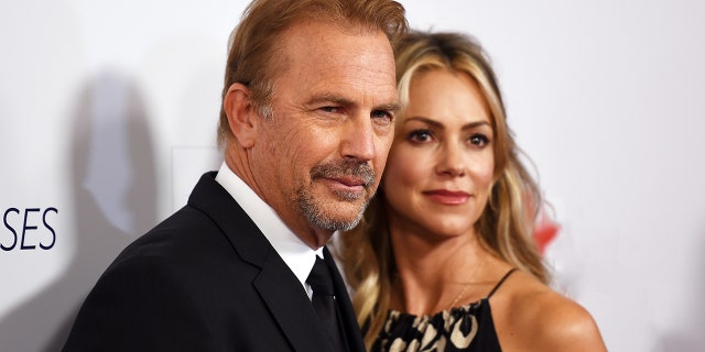 Kevin Costner and Christine Baumgartner attend red carpet event