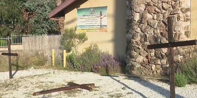 Burned crosses outside church