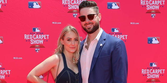 Lucas Giolito poses with his wife at the MLB Red Carpet Show in 2019