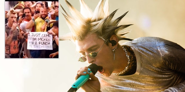 Machine Gun Kelly with long spikes sticking up sings into the microphone looking down, inset a photo of him next to a fan holding a sign asking to be punched
