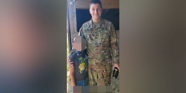 Michael Burham wears army uniform