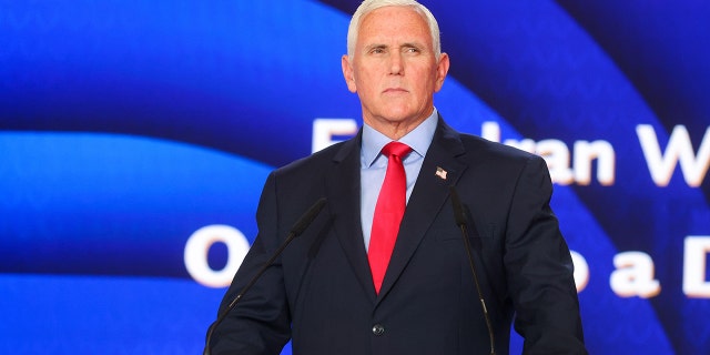 Former Vice President Mike Pence delivers a speech in Paris, France