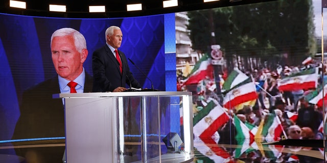 Former Vice President Mike Pence delivers a speech in Paris, France