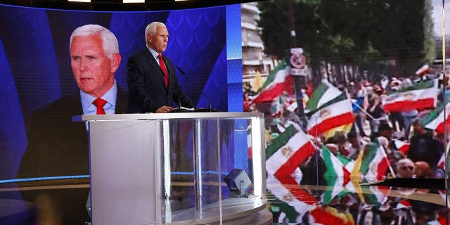 Former Vice President Mike Pence delivers a speech in Paris, France