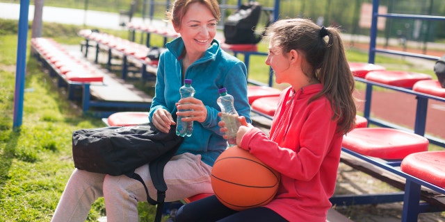 Mother with athlete