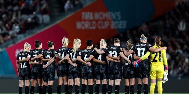 New Zealand players observe a moment of silence after the Auckland shooting