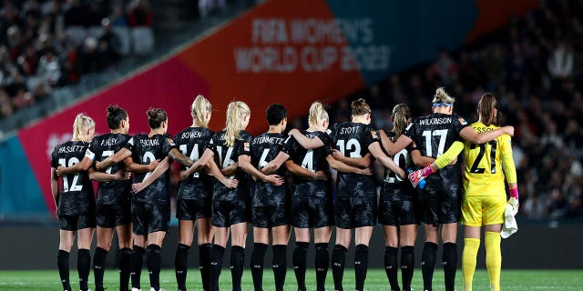 New Zealand players observe a moment of silence after the Auckland shooting