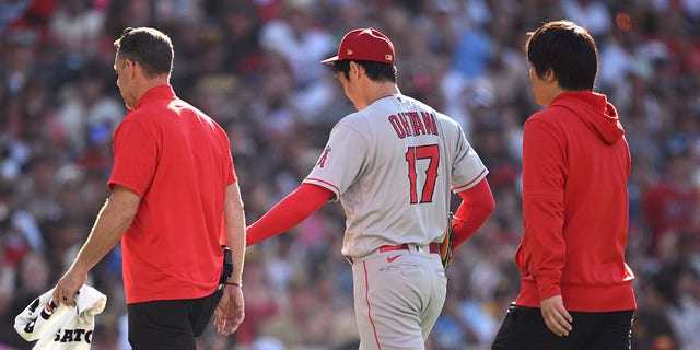 Ohtani leaves with the coach