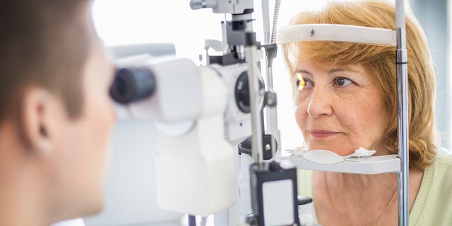 Older woman eye exam
