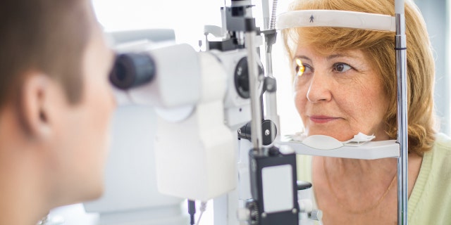 Older woman eye exam