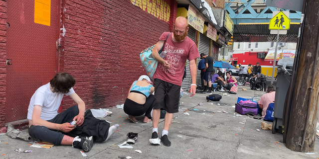 Drug users outside convenience store in Philadelphia