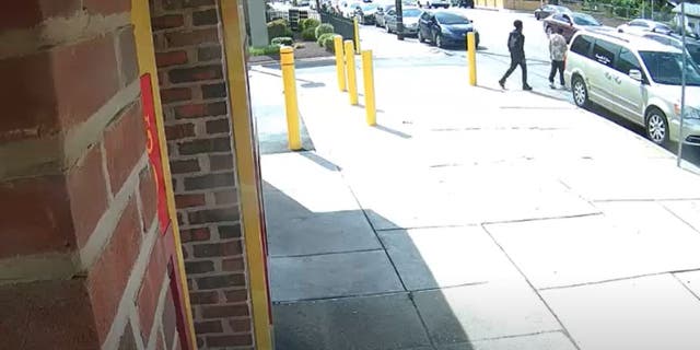 Shot of suspect approaching victim
