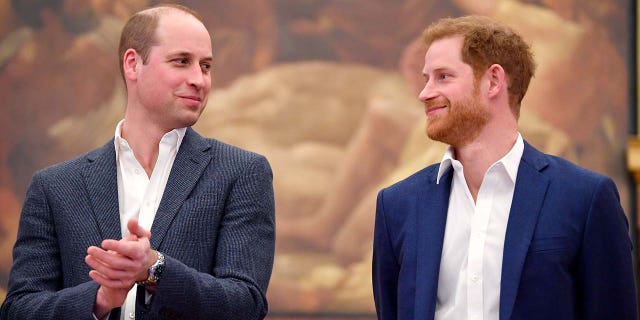 Princes William and Harry looking at each other