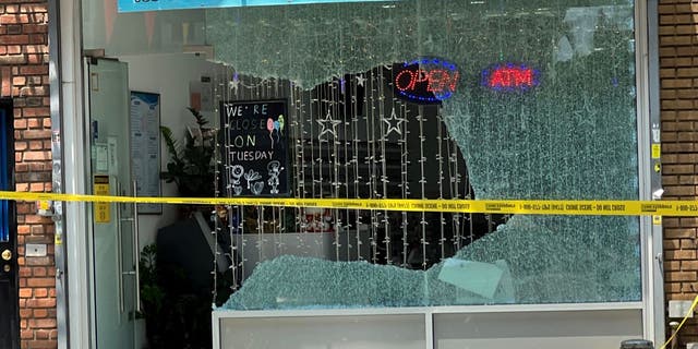 Shattered business window in Queens