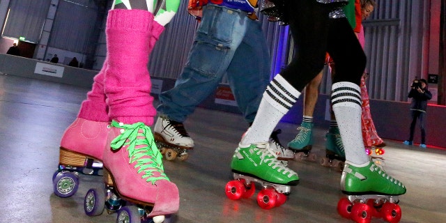 Pink and green roller blades