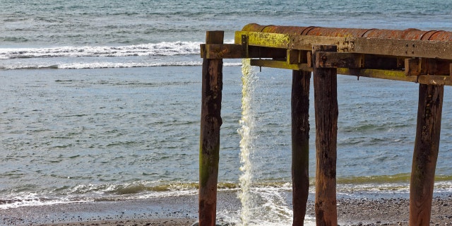 Runoff into ocean from pier