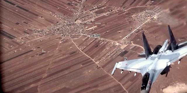 Russia plane flying near U.S. drone