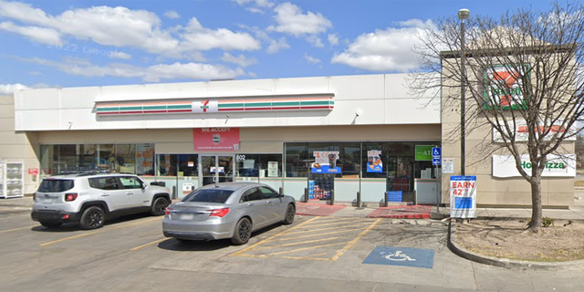 7-Eleven parking lot with cars