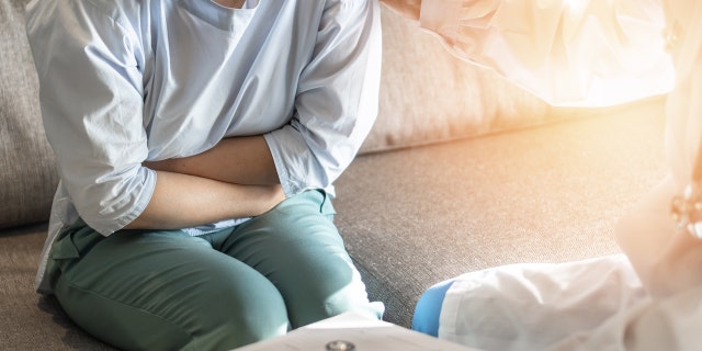 Woman feeling sick