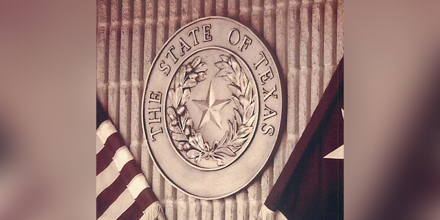 Texas logo in a courtroom