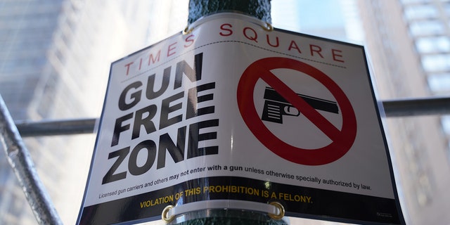 Signs proclaim Times Square is a gun free zone