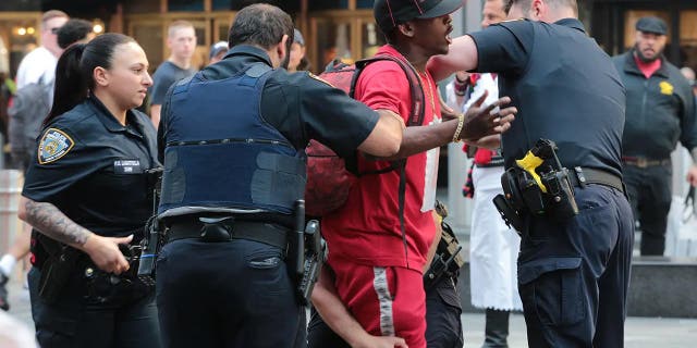 Man with a knife in Times Square is stopped by police