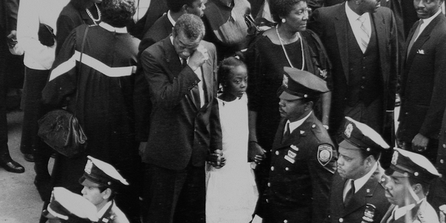 NYPD funeral with young daughter