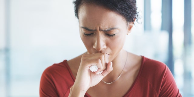 woman coughing