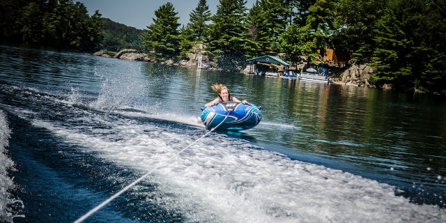 Woman tubing on a lake