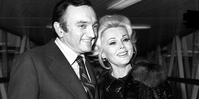 Jack Ryan and Zsa Zsa Gabor smile for cameras.