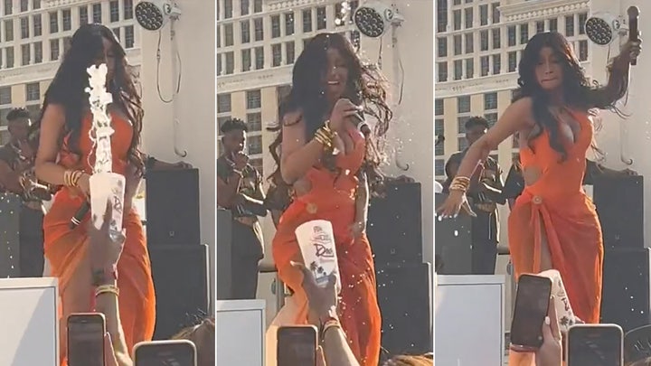 Cardi B throws a microphone at audience member during Vegas concert