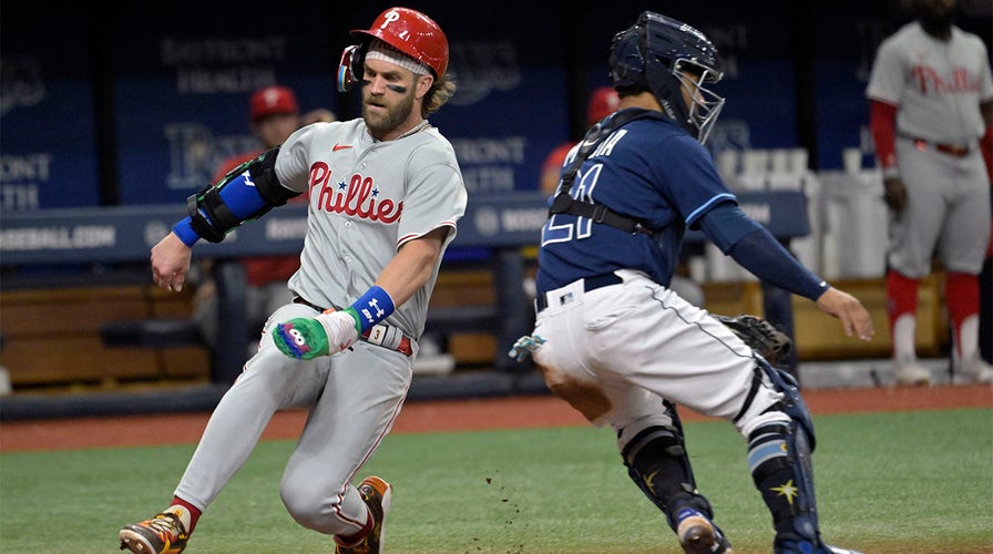 Phillies win 11th straight road game with victory over AL leading