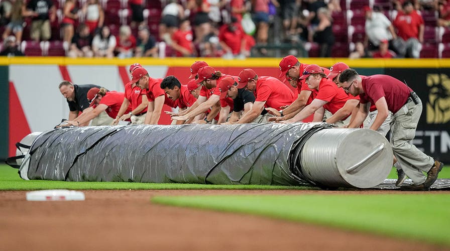 Wet weather brings baseball grounds crew mishaps, ballplayers fun