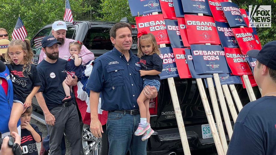 Ron DeSantis greets supporters before an Independence Day parade.