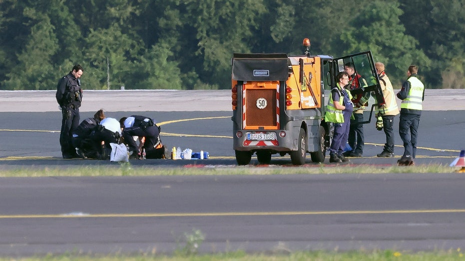 Activists’ strange runway glue protest disrupts dozens of flights as capital’s roads also targeted