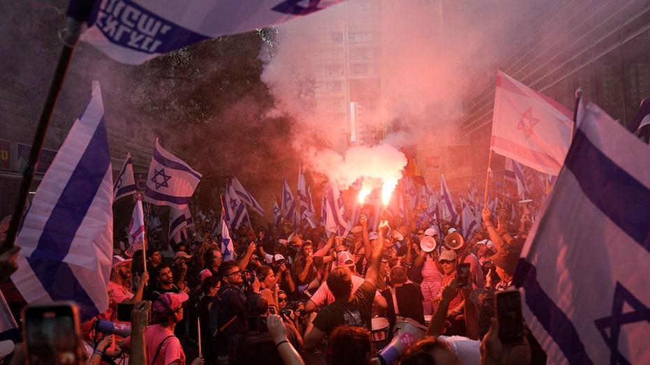 Israeli protesters start ‘day of disruption’ by blocking military headquarters, stock market