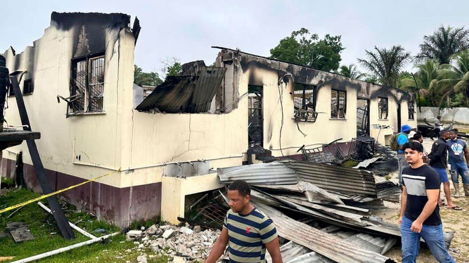 Guyana government reaches settlement after 20 children burned to death in high school dormitory fire