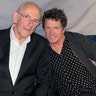 Michael J. Fox and Christopher Lloyd posing for a photo together