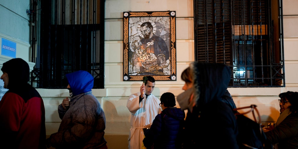 Argentines ask patron saint of work for jobs as economy tanks, elections loom - Vimarsana News