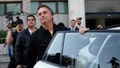 Former President Jair Bolsonaro of Brazil gets into a car after landing at the airport in Rio de Janeiro, Thursday, June 29, 2023.