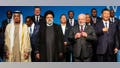 South African President Cyril Ramaphosa with fellow BRICS leaders President of Brazil Luiz Inacio Lula da Silva, President of China Xi Jinping pose for a family photo with delegates, including six nations invited to join the BRICS group, Argentina, Egypt, Ethiopia, Iran, the United Arab Emirates and Saudi Arabia, during the closing day of the BRICS Summit at the Sandton Convention Center on August 24, 2023 in the Sandton district of Johannesburg, South Africa.