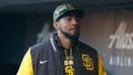 Robert Suarez #75 of the San Diego Padres looks on in the dugout before the game against the San Francisco Giants at Oracle Park on May 20, 2022 in San Francisco, California.