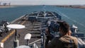 A U.S. Navy sailor from USS Bataan stands watch as the amphibious assault ship transits the Suez Canal with the 26th Marine Expeditionary Unit on Aug. 6.